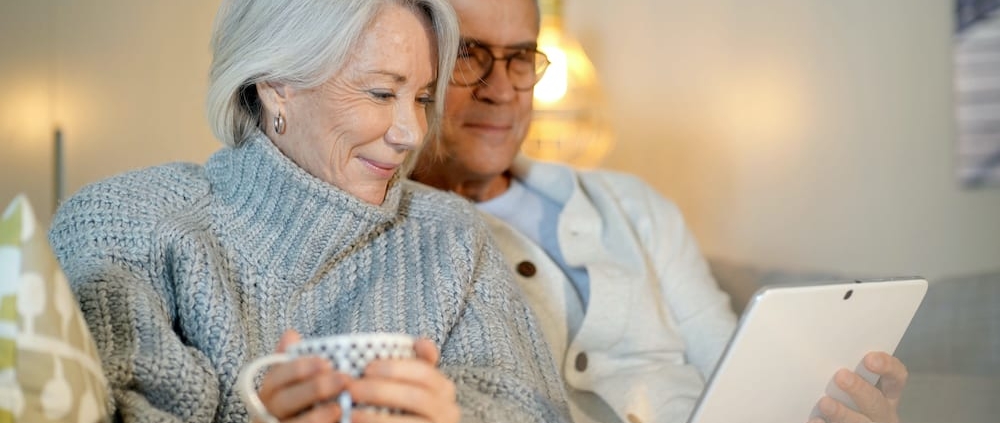 elderly couple reading