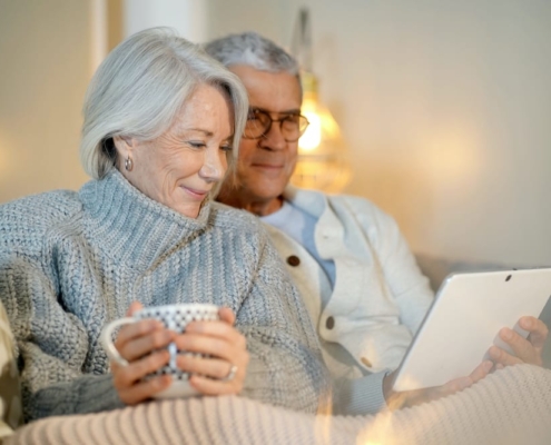 elderly couple reading